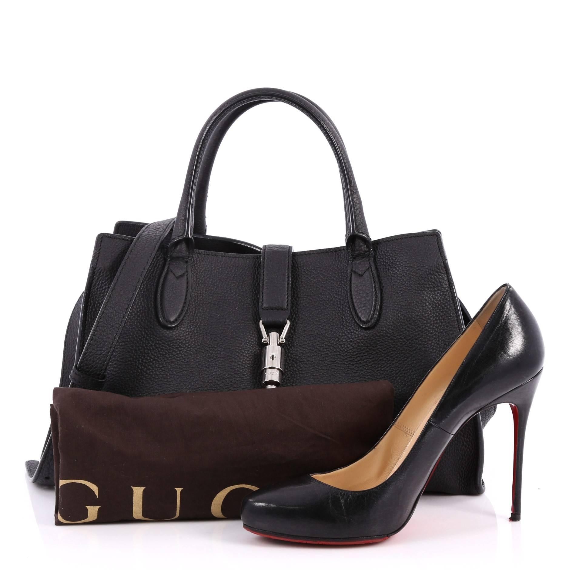 This authentic Gucci Jackie Soft Tote Leather Small is a must-have tote fit for the modern woman. Constructed from black leather, this iconic minimalist take on the iconic Jackie features a soft-structured silhouette, dual-rolled handles, and