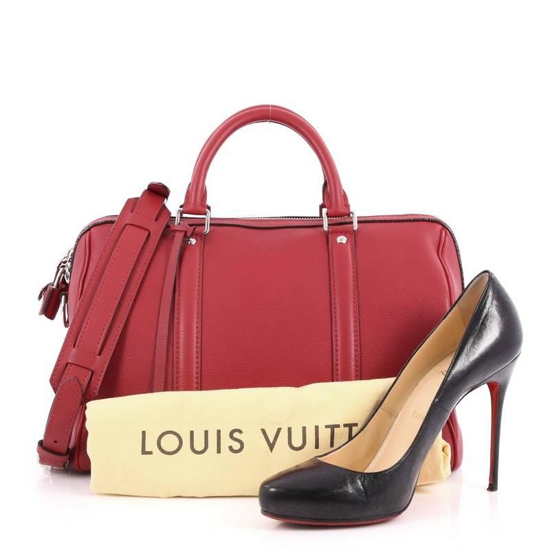This authentic Louis Vuitton Sofia Coppola SC Bag Leather PM is a stylish and elegant everyday bag. Crafted from red leather, this simple yet refined duffle bag features sturdy rolled handles, adjustable shoulder strap, protective base studs and
