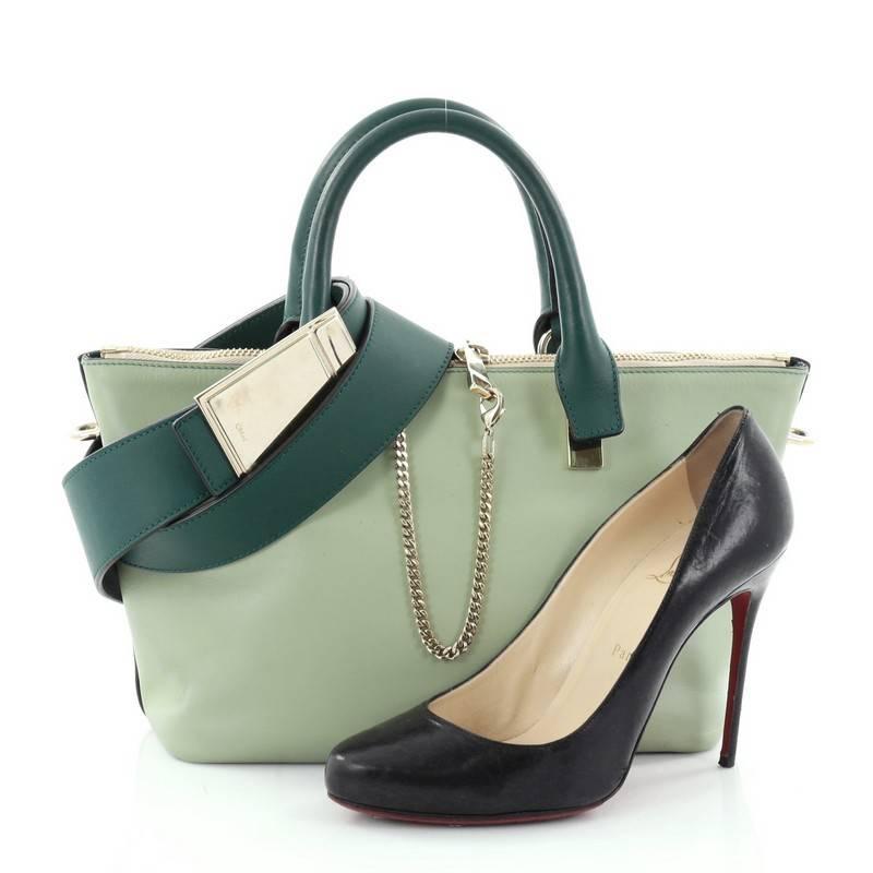 This authentic Chloe Bicolor Baylee Satchel Leather Small showcasing Chloe's signature balance of casual feminine style in its minimalist design is a perfect day-to-day companion. Constructed from bicolor green and light green leather, this satchel