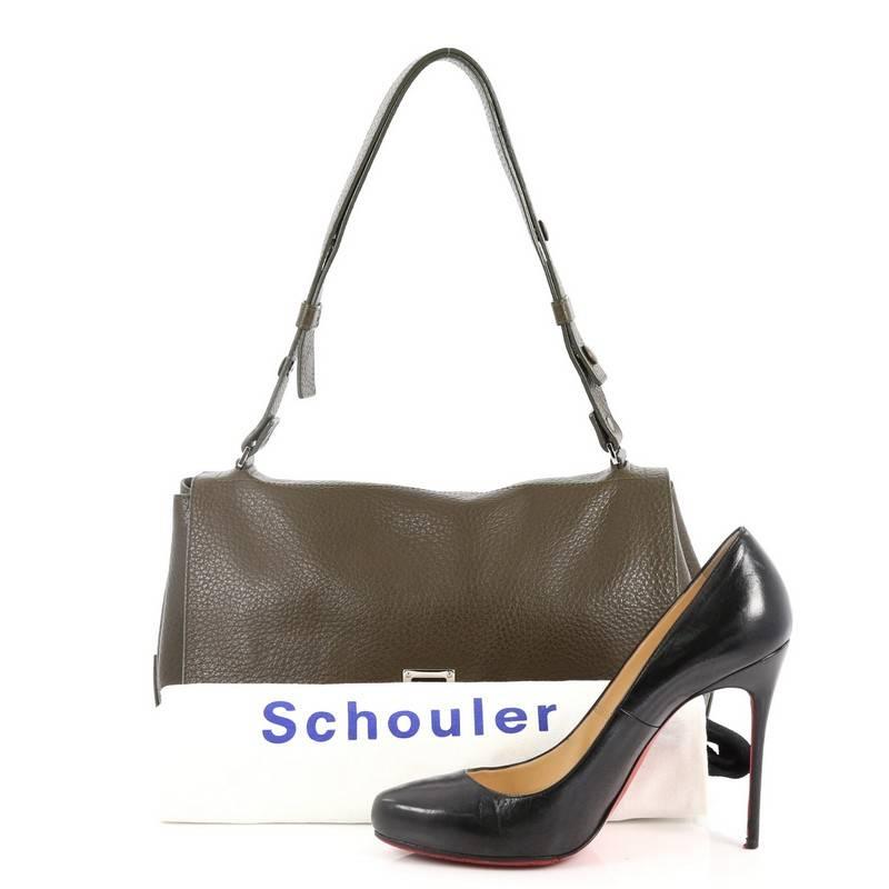 This authentic Proenza Schouler Courier Bag Leather Medium is a minimalist stylish bag loved by fashionistas. Crafted from olive leather, this modern bag features adjustable snap-button shoulder strap, expandable snap sides, exterior back pocket,