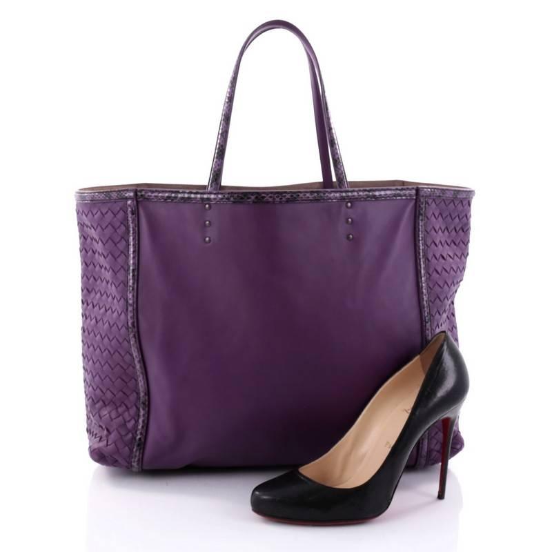 This authentic Bottega Veneta Shopping Tote Leather with Intrecciato Detail Large is an understated and practical shopper tote perfect for everyday use. Crafted in purple nappa leather with intrecciato detailing, this tote features dual leather