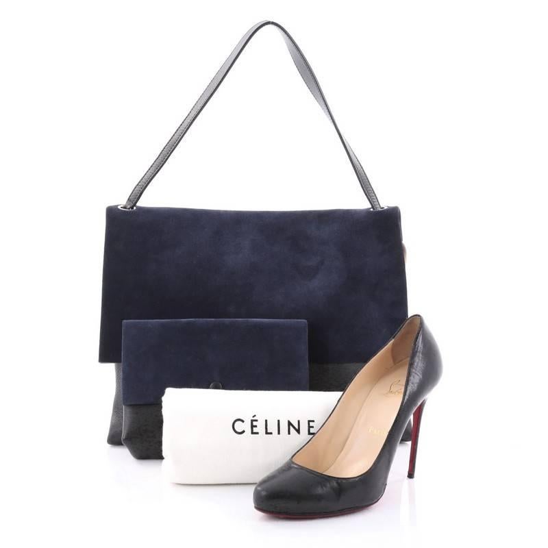 This authentic Celine All Soft Tote Suede is a neutral and understated look perfect for the modern woman. Crafted from blue suede and black leather, this minimalist tote features a single leather shoulder strap, subtle stamped Celine logo and