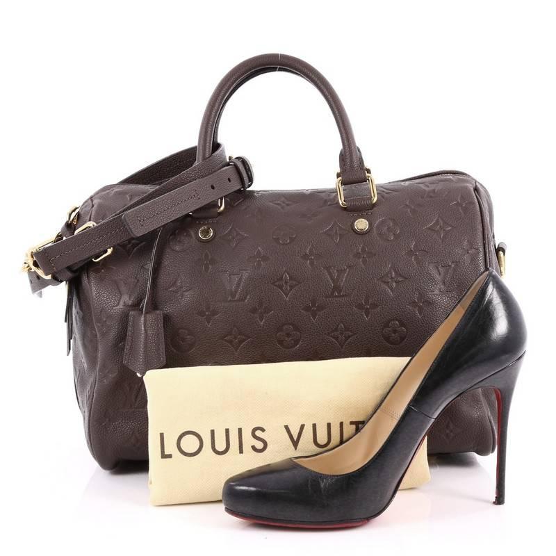 This authentic Louis Vuitton Speedy Bandouliere Bag Monogram Empreinte Leather 30 is a modern must-have. Constructed from Louis Vuitton's luxurious brown monogram embossed empreinte leather, this iconic and re-imagined Speedy features dual-rolled