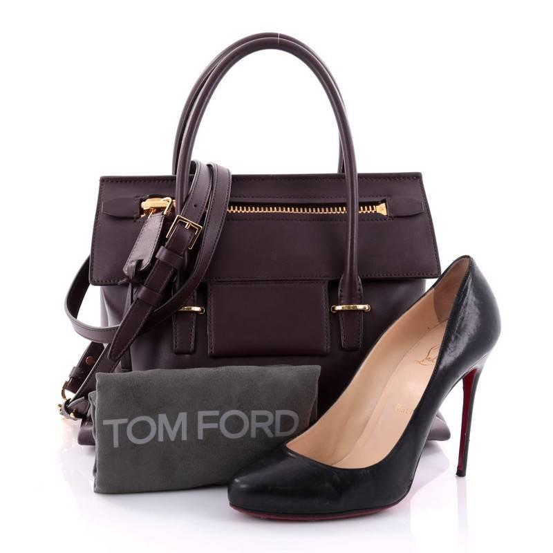 This authentic Tom Ford Icon Tote Leather Small is simple in design ideal for everyday use. Crafted in burgundy grainy leather, this tote features dual rolled-leather handles, exterior front zip and back patch pockets, slip pocket under its flap,
