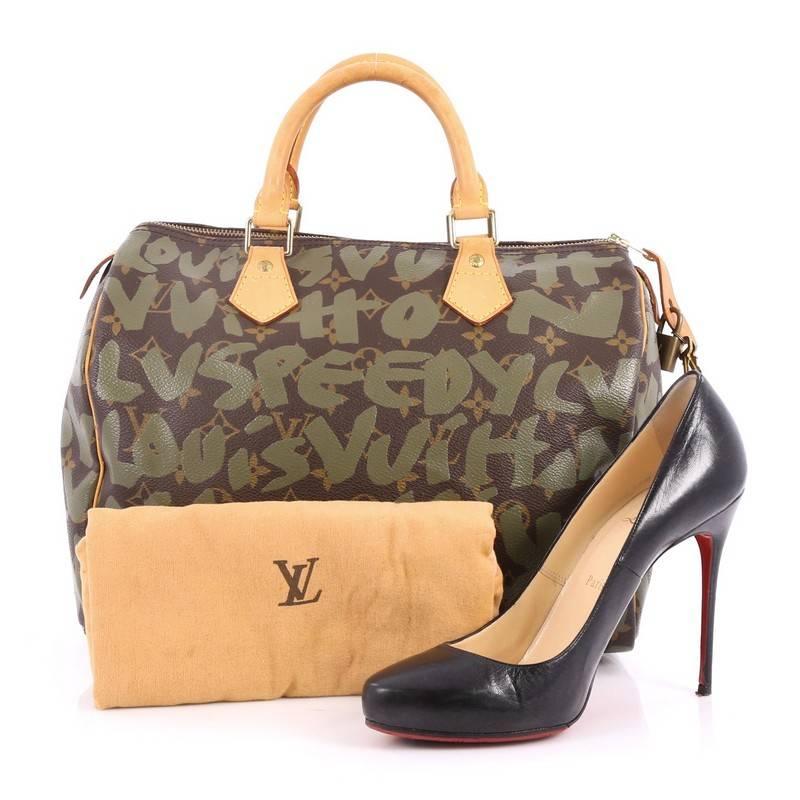 This authentic Louis Vuitton Speedy Handbag Limited Edition Monogram Graffiti 30 is a rare and stylish item for any handbag collector. Crafted from Louis Vuitton's brown monogram canvas adorned with green graffiti print by Stephen Sprouse, this bag
