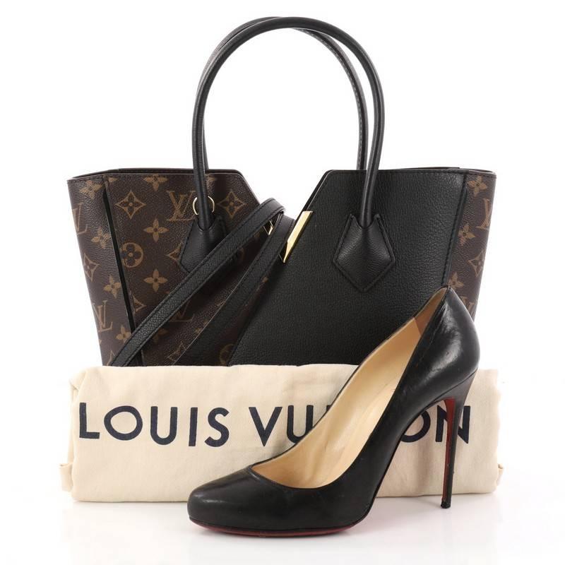 This authentic Louis Vuitton Kimono Handbag Monogram Canvas and Leather PM is inspired by traditional Japanese robes combining luxurious design with modern silhouette. Crafted from iconic brown monogram coated canvas and noir black calf leather,