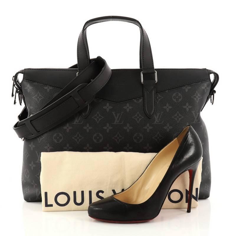 This authentic Louis Vuitton Explorer Briefcase Limited Edition Monogram Eclipse Canvas is a stylish bag that adds sophistication to your everyday looks. Crafted in black eclipse monogram coated canvas, this briefcase features dual-flat leather