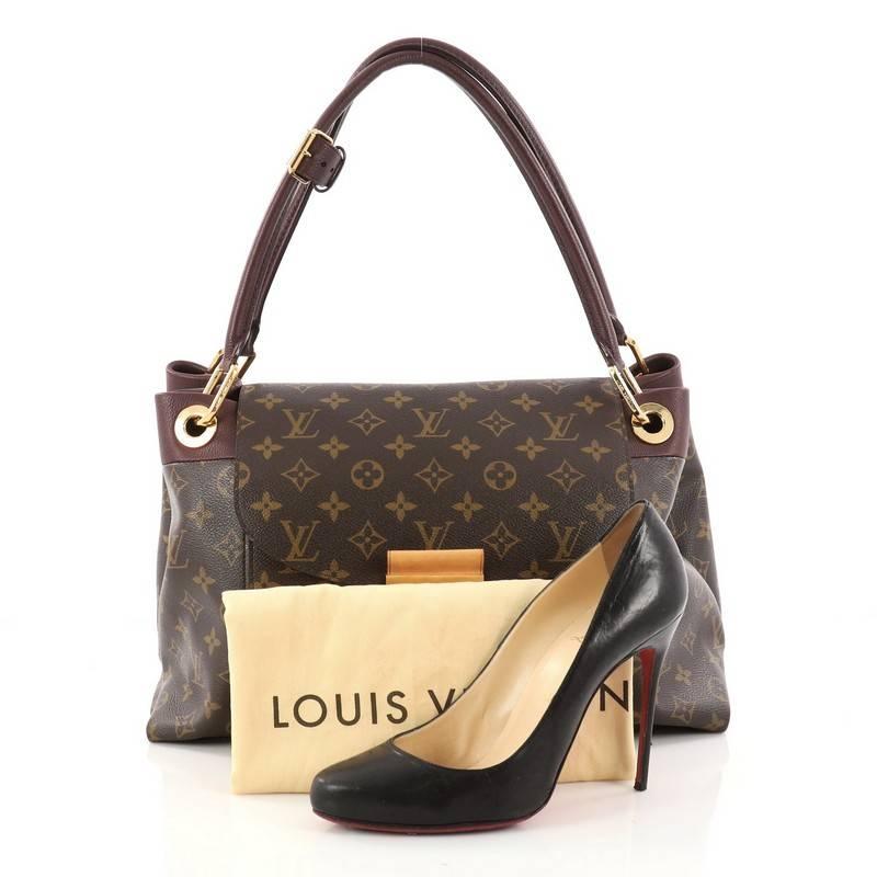 This authentic Louis Vuitton Olympe Handbag Monogram Canvas showcases the brand's heritage-inspired style with added sophistication. Crafted from signature brown monogram coated canvas and burgundy leather trims, this bag features tall dual-rolled