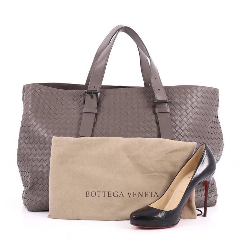 This authentic Bottega Veneta A-Shape Tote Intrecciato Nappa XL is a statement piece you can surely everyday. Beautifully crafted in dark taupe nappa leather in Bottega Veneta's signature intrecciato woven method, this oversized stylish tote