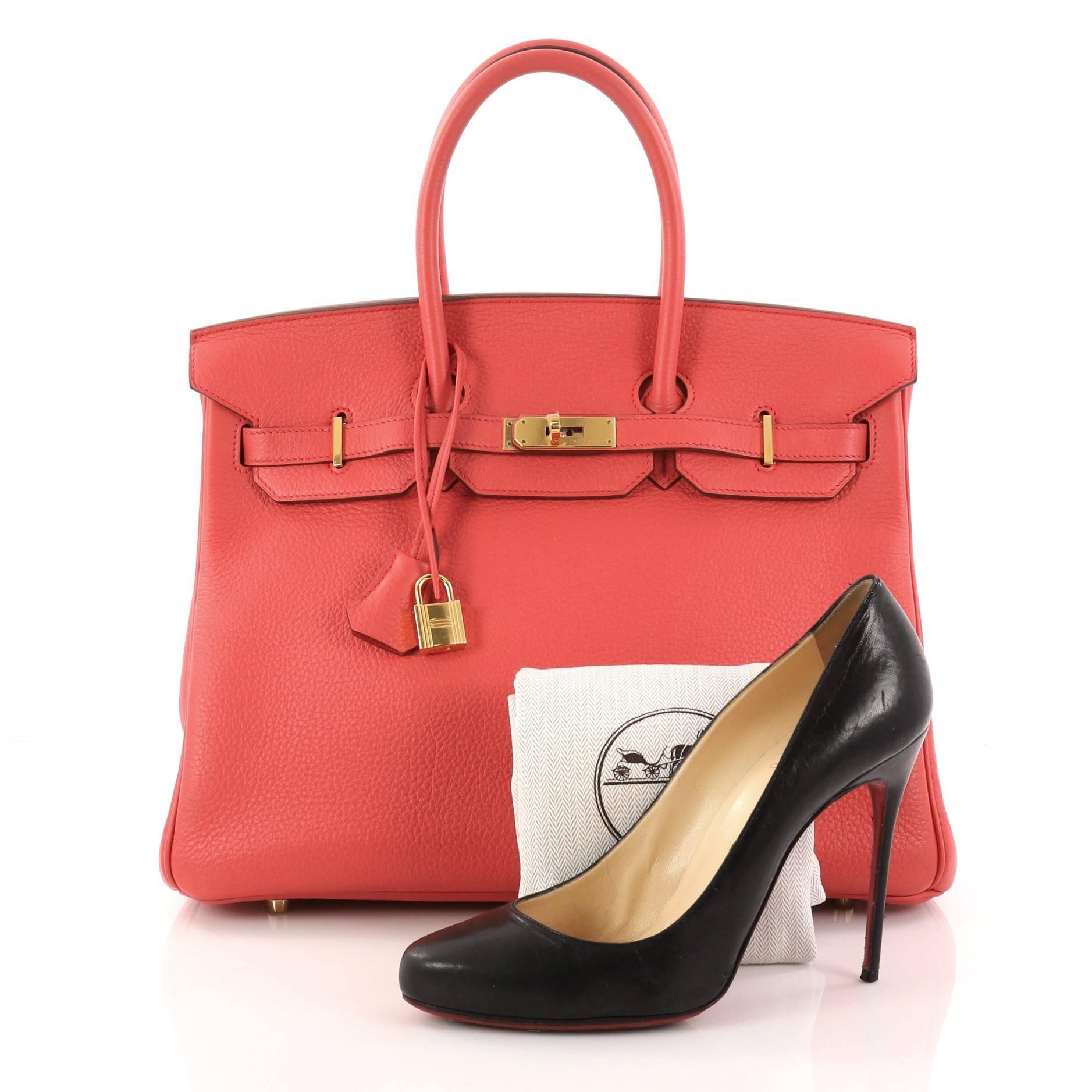 This authentic Hermes Birkin Handbag Bougainvillea Togo With Gold Hardware 35 is synonymous to traditional Hermes luxury. Crafted with sturdy, scratch-resistant Bougainvillea togo leather, this eye-catching tote features dual-rolled top handles, a