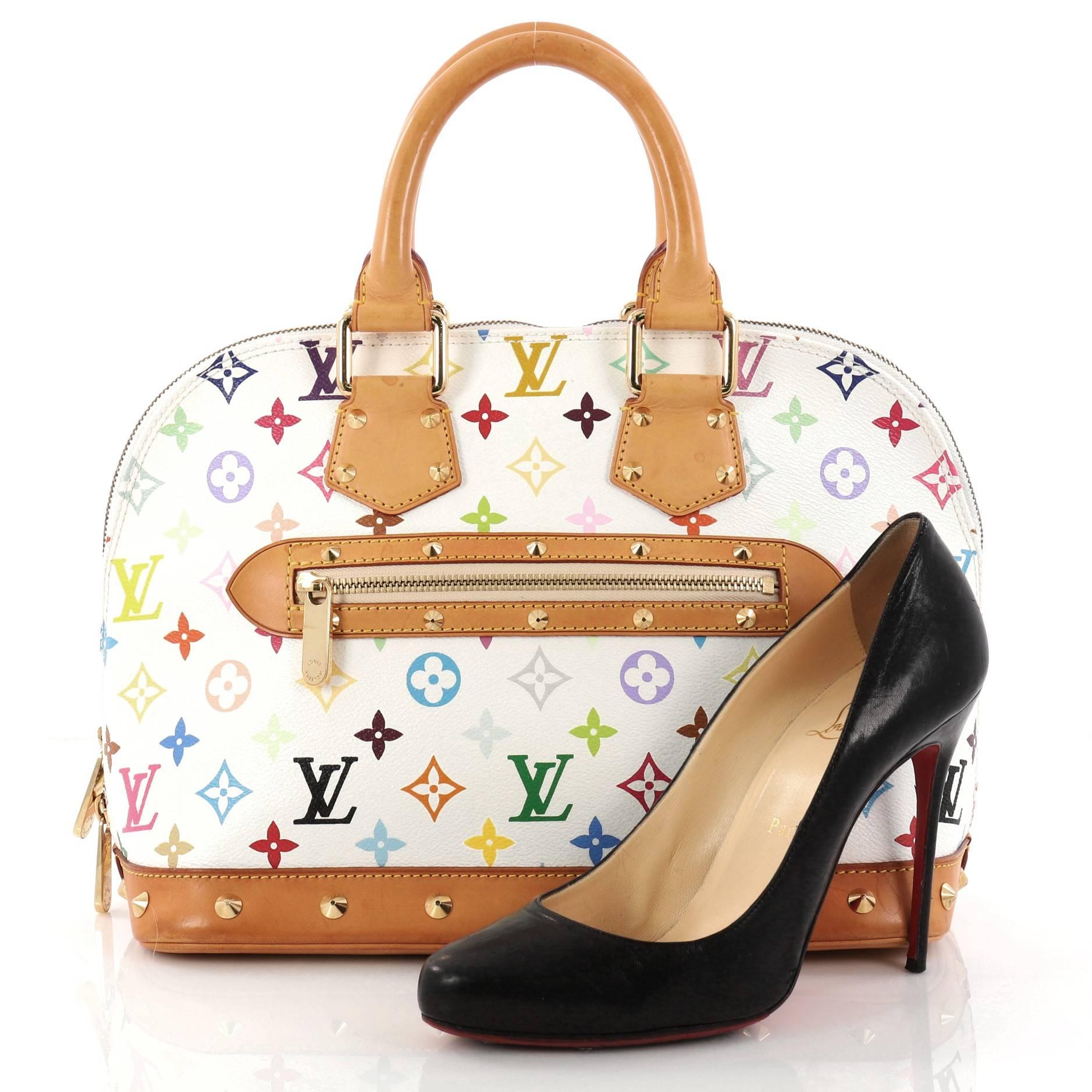 This authentic Louis Vuitton Alma Handbag Monogram Multicolor PM is a versatile structured bag that complements both dressy and casual looks, perfect for the modern woman. Designed in Takashi Murakami's famous white monogram multicolor coated