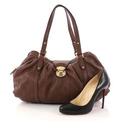 Louis Vuitton Lunar Handbag Mahina Leather GM