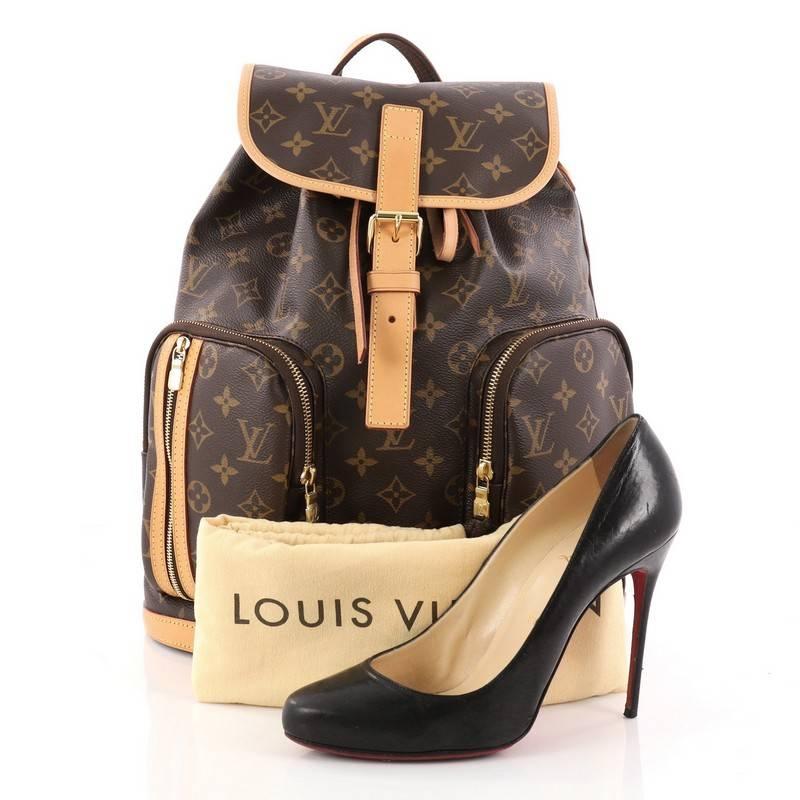 This authentic Louis Vuitton Bosphore Backpack Monogram Canvas is perfect for on-the-go fashionistas. Crafted from Louis Vuitton's brown monogram coated canvas with vachetta leather trims, this chic sold-out backpack features gold-tone hardware