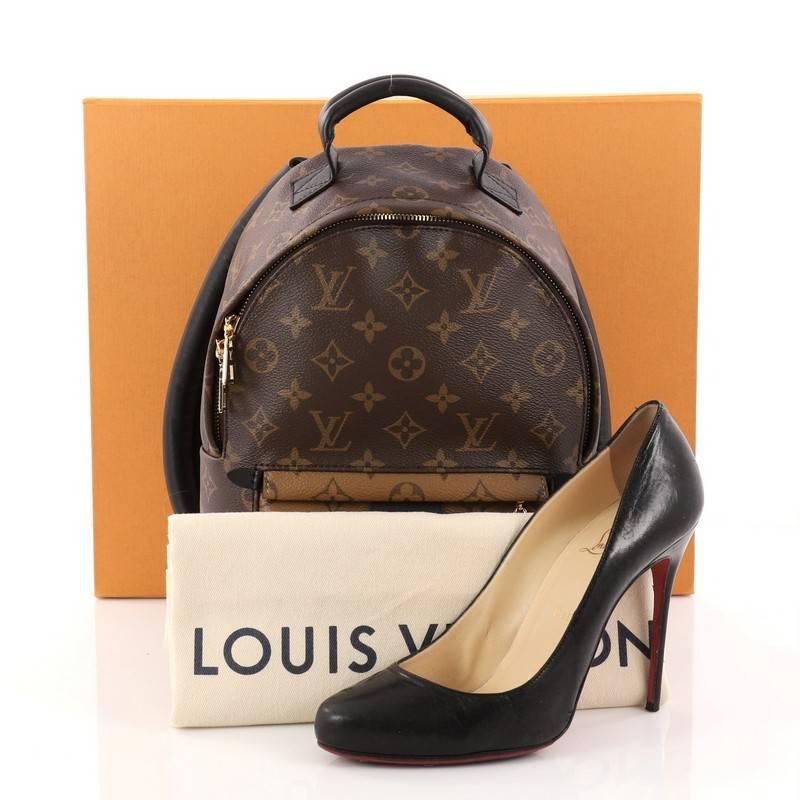 This authentic Louis Vuitton Palm Springs Backpack Reverse Monogram Canvas PM is a standout bag made for care-free urban fashionistas. Crafted from brown monogram coated canvas, this chic functional backpack features padded leather top handle,