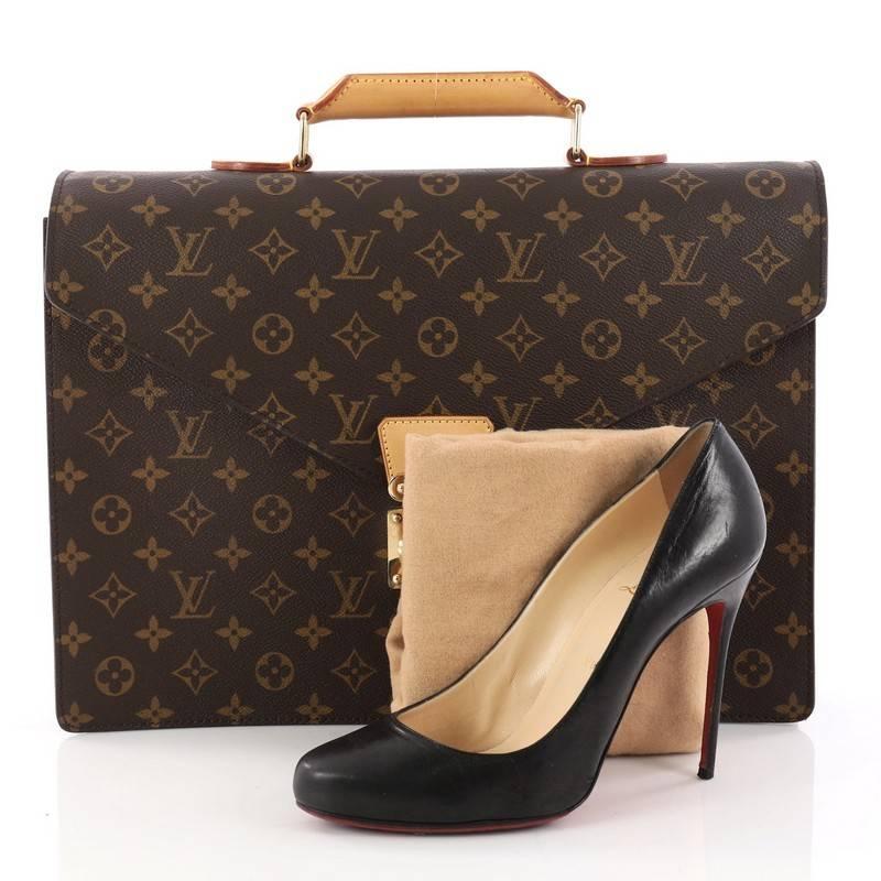 This authentic Louis Vuitton Serviette Conseiller Briefcase Monogram Canvas is a rare and classic accessory perfect for professionals. Crafted from brown monogran coated canvas, this stylish bag features a sturdy reinforced leather top handle, a