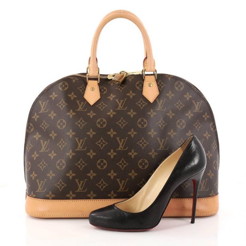 This authentic Louis Vuitton Alma Handbag Monogram Canvas GM is a fresh and elegant spin on a classic style that is perfect for all seasons. Crafted from Louis Vuitton's brown monogram coated canvas, this dome-shaped satchel features gold-tone