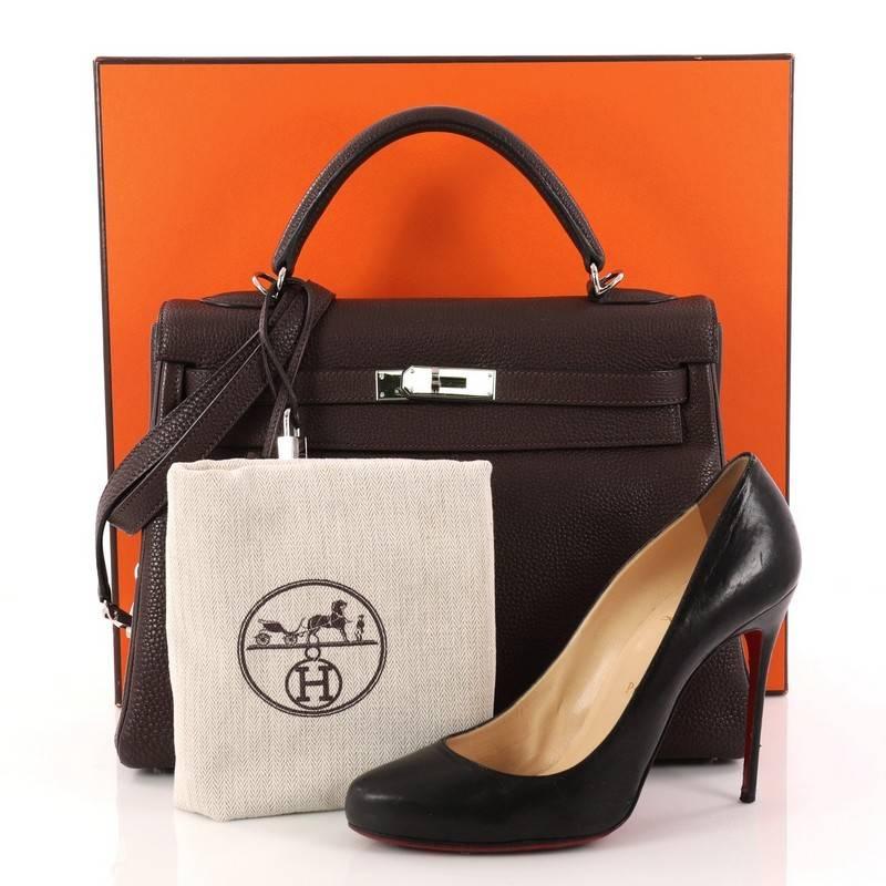This authentic Hermes Kelly Handbag Ebene Togo with Palladium Hardware 32 is as classic and timeless as they come. Designed from Ebene Togo leather, this Kelly showcases Hermes' beautiful craftsmanship and devotion to quality pieces. This structured