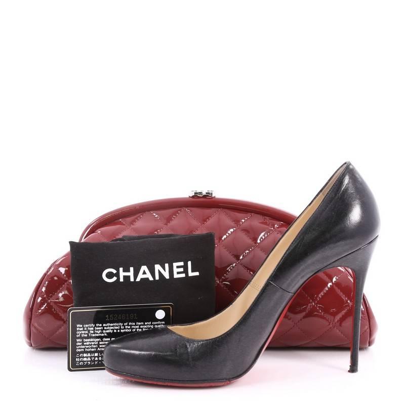 The authentic Chanel Timeless Clutch Quilted Patent is the perfect piece to pair with almost any outfit. Crafted from dark red quilted patent leather, this classic clutch features a silver-tone CC logo snap closure, oval top frame silhouette and