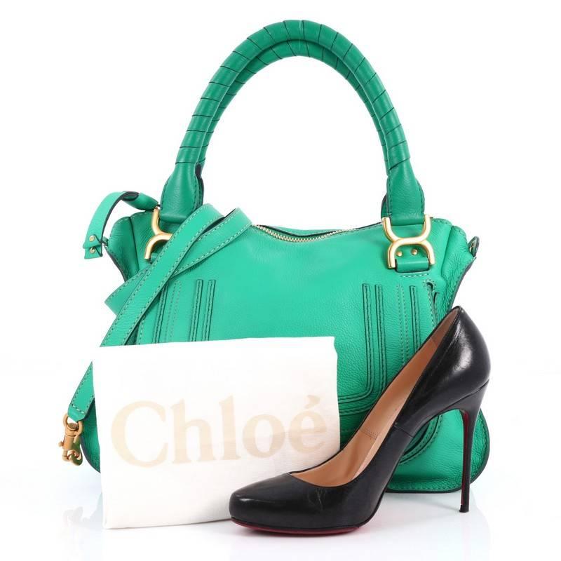 This authentic Chloe Marcie Satchel Leather Medium is perfect for the on-the-go fashionista. Constructed from emerald green leather, this popular satchel features wrapped leather handles, horseshoe stitched front flap, and gold-tone hardware. Its