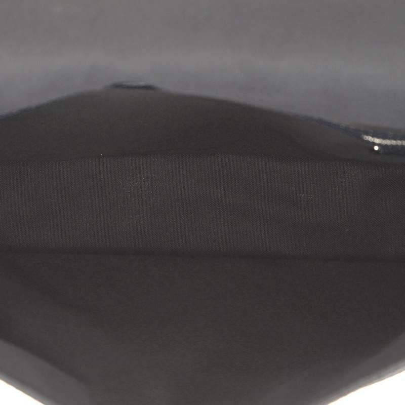 Louis Vuitton Taiga Leather MM Roman Handbag  1