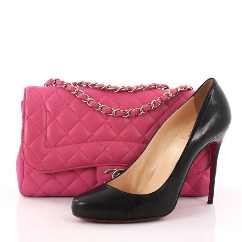 This authentic Chanel Mademoiselle Chic Flap Bag Quilted Lambskin Medium is a chic and gorgeous bag ideal for your day or evening looks. Crafted in hot pink quilted lambskin, this chic flap bag features woven-in leather chain strap, full-frontal
