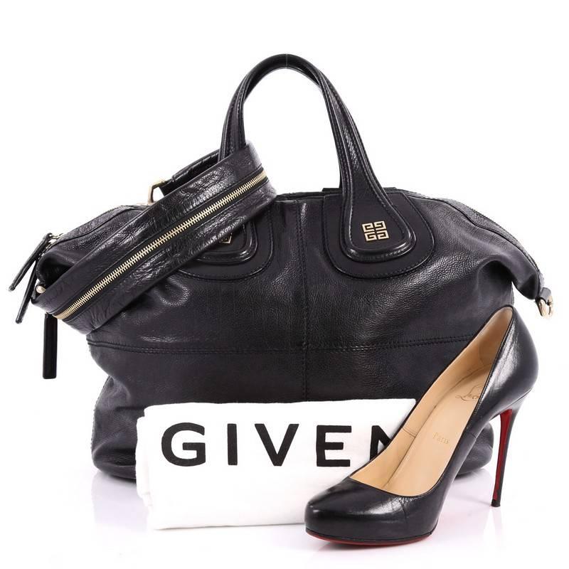 This authentic Givenchy Nightingale Satchel Glazed Leather Medium is a stylish and functional carry-all fit for all needs. Constructed in black glazed leather, this satchel is defined by its stitched quarters, gold-one Givenchy logo at its handles,