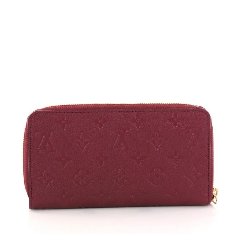 Louis Vuitton Secret Wallet Monogram Empreinte Leather In Good Condition In NY, NY