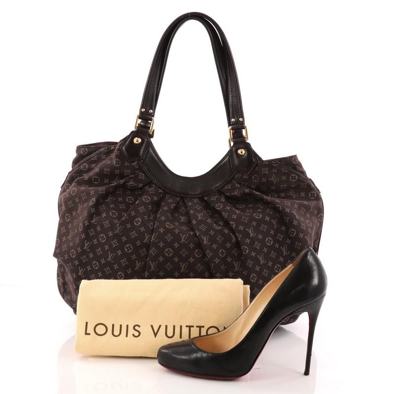 This authentic Louis Vuitton Fantaisie Handbag Monogram Idylle showcases a blend of femininity and sophisticated in the design. Crafted from brown Idylle mini monogram canvas with leather trims, this ultra spacious bag features flat leather handles,