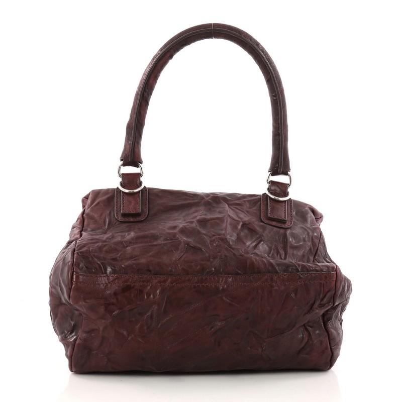 worn leather messenger bag