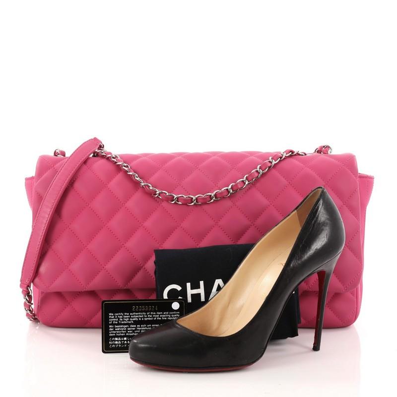 This authentic Chanel Coco Rain Flap Bag Quilted Rubber Jumbo is a chic and stylish bag perfect to add to your collection. Crafted in pink quilted rubber, this gorgeous bag features a thinner woven-in rubber chain strap, a super useful raincoat that