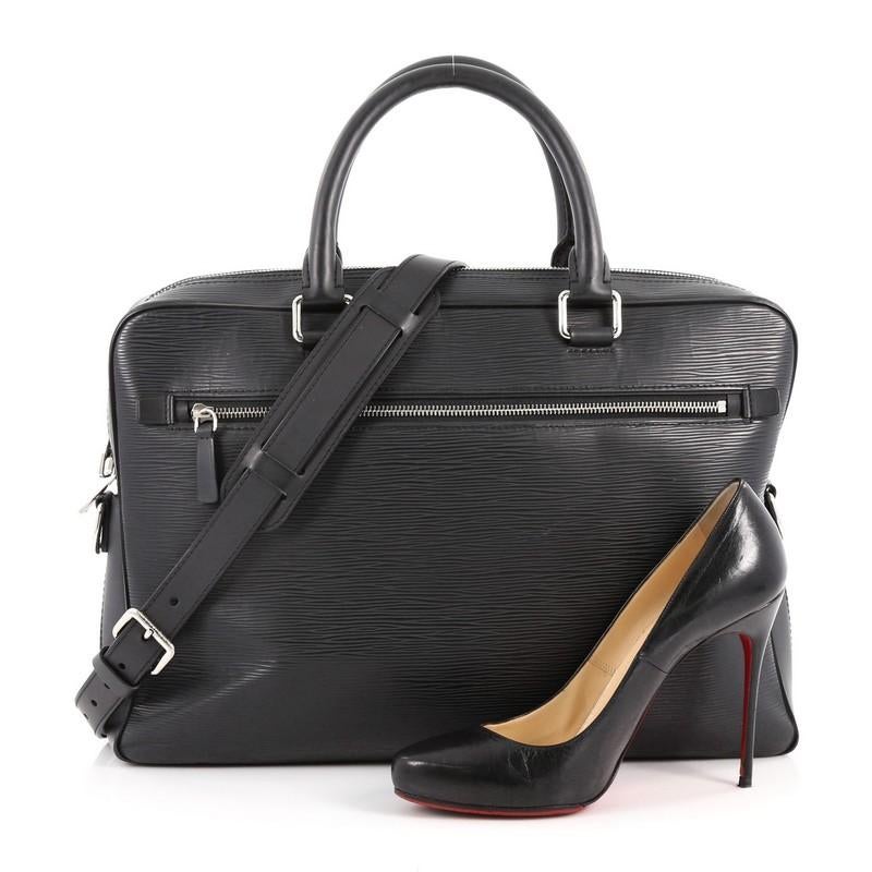 This authentic Louis Vuitton Porte-Documents Business Bag Epi Leather is perfect for daily or business excursions. Crafted from black epi leather, this stylish and functional bag features dual-rolled leather handles, exterior zip pocket, subtle LV