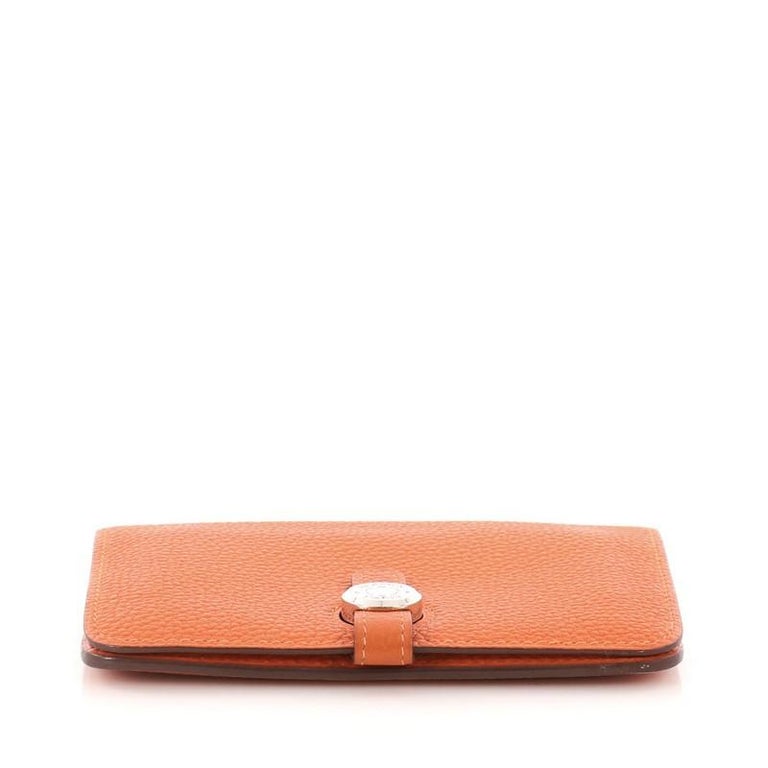 Shop HERMES Dogon compact wallet (H066382CK9R) by IFME_AK