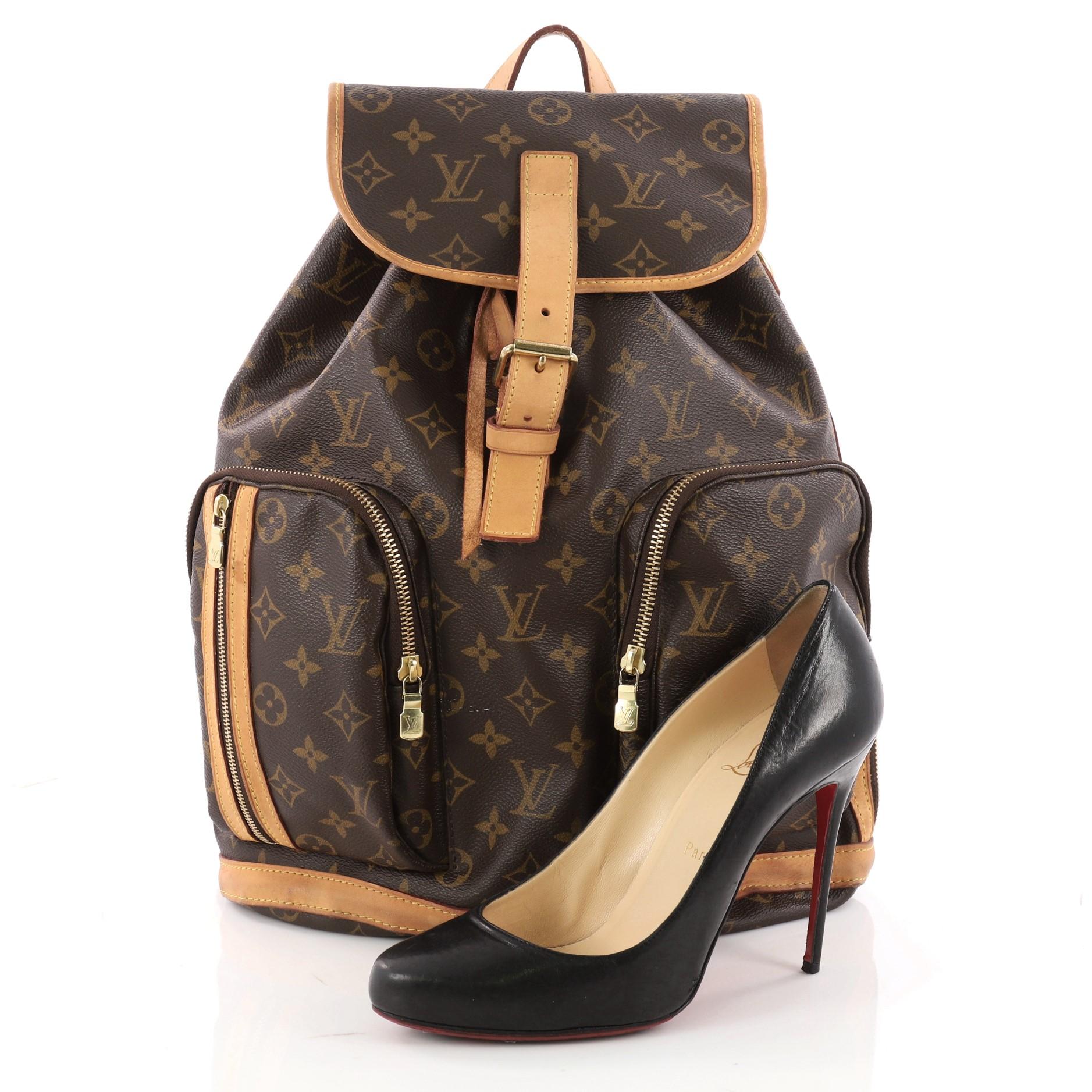 This authentic Louis Vuitton Bosphore Backpack Monogram Canvas is perfect for on-the-go fashionistas. Crafted from Louis Vuitton's brown monogram coated canvas with vachetta leather trims, this popular backpack features exterior front zip pockets,
