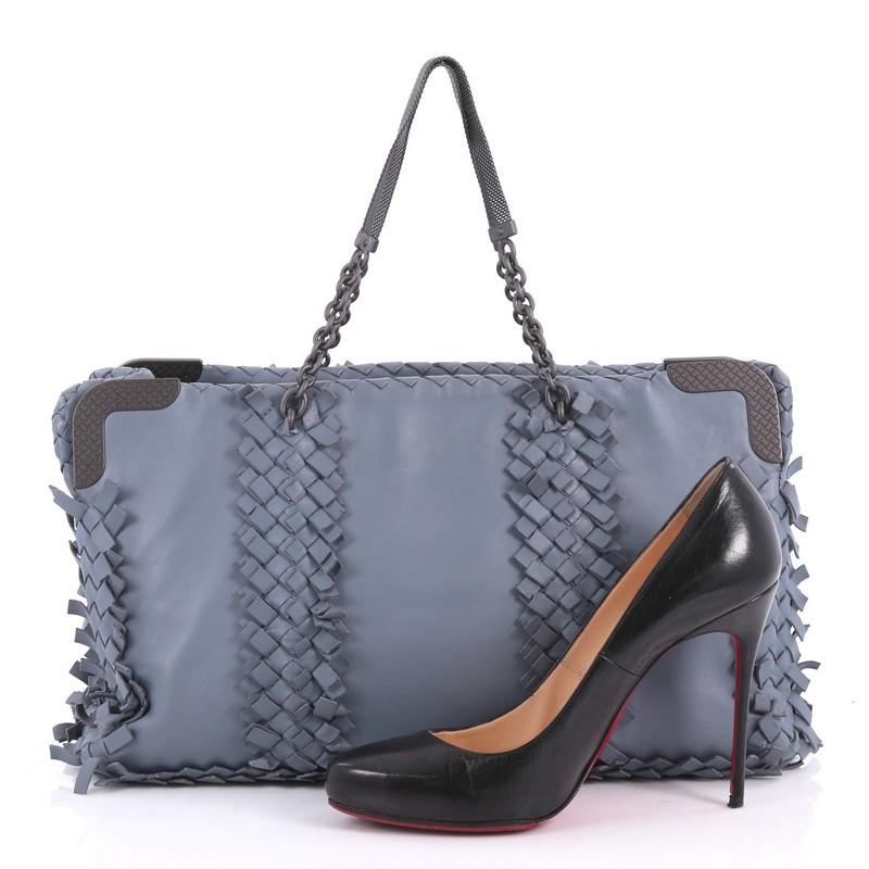 This authentic Bottega Veneta Chain Tote Leather with Fringe Intrecciato Detail Large is a timeless, versatile piece you can surely take everyday. Beautifully crafted from light blue nappa leather with Bottega Veneta's unique fringe intrecciato