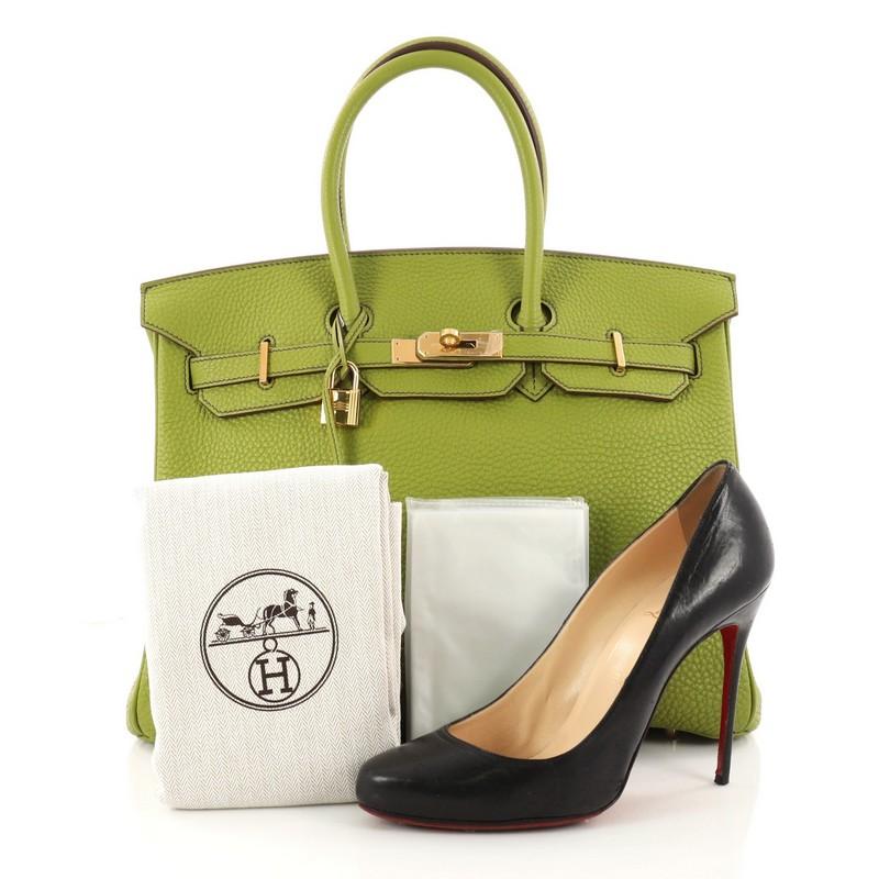 This authentic Hermes Birkin Handbag Vert Anis Togo with Gold Hardware 35 stands as one of the most-coveted and timeless bags fit for any fashionista. Constructed from scratch-resistant Vert Anis Togo leather, this subtly sleek tote features