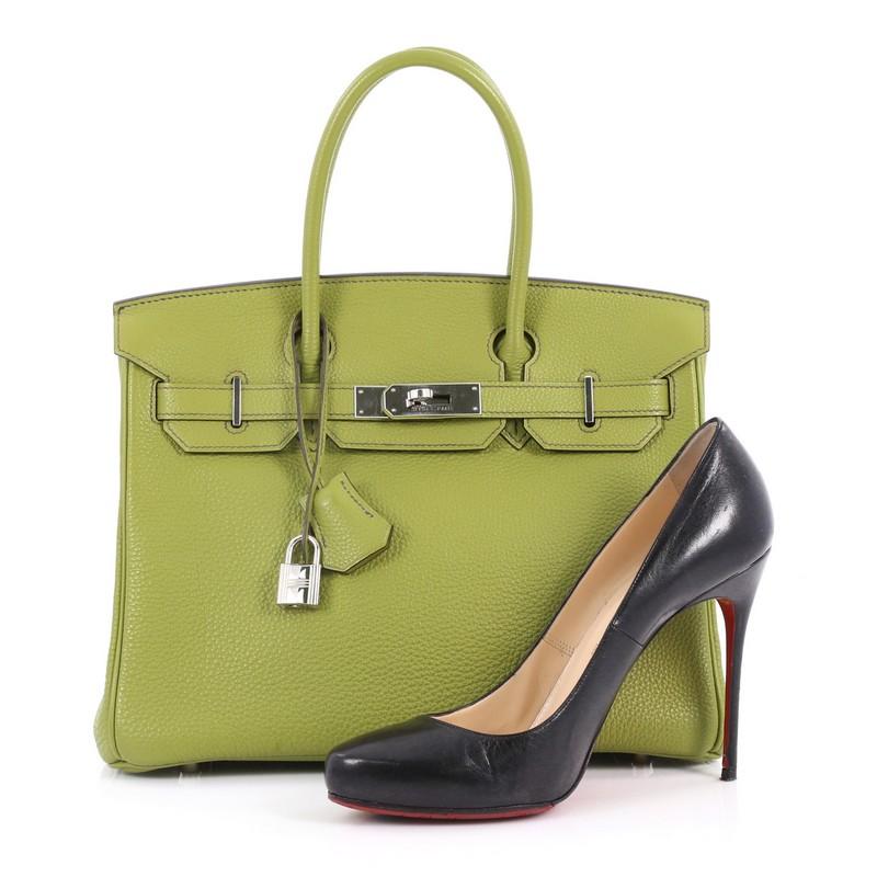 This authentic Hermes Birkin Handbag Vert Anis Togo with Palladium Hardware 30 stands as one of the most-coveted bags fit for any fashionista. Constructed from sturdy, scratch-resistant Vert Anis Togo leather, this stand-out oversized tote features