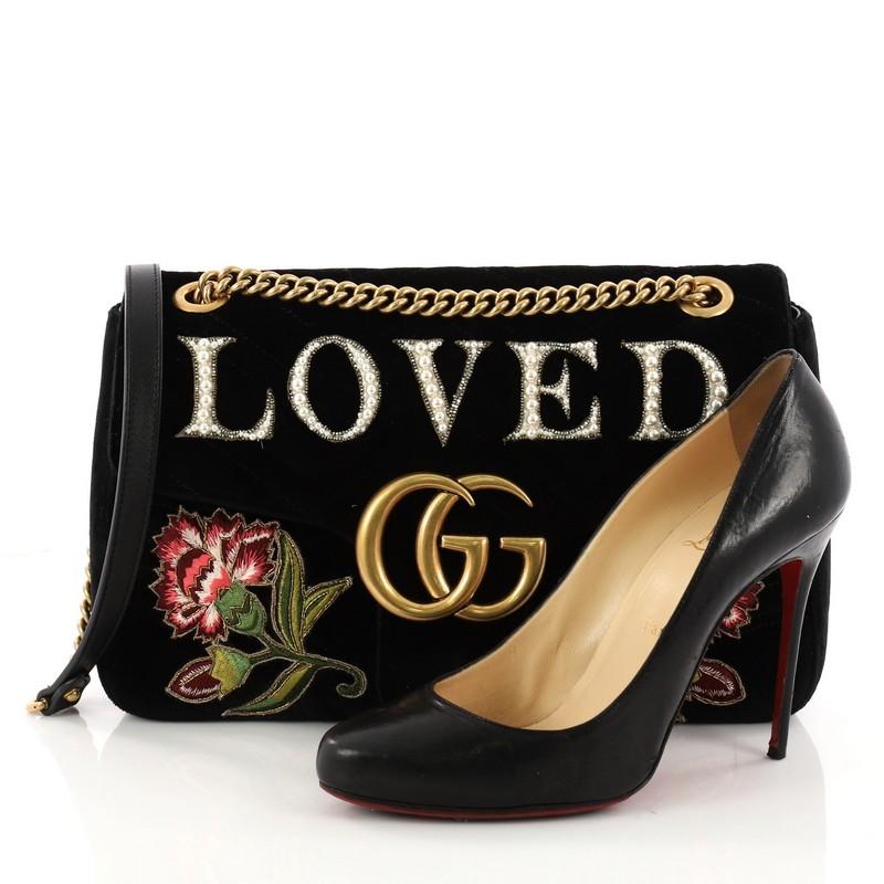 This authentic Gucci GG Marmont Flap Bag Embroidered Matelasse Velvet Medium is a gorgeous and chic bag designed by Alessandro Michele. Crafted in black matelasse velvet, this bag features chain-link shoulder strap with leather pad, embroidered