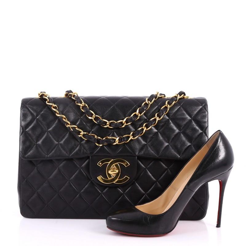 This authentic Chanel Vintage Classic Single Flap Bag Quilted Lambskin Maxi is a timeless essential for any modern woman. Crafted in black quilted lambskin leather, this classic flap bag features woven-in leather chain strap, exterior back pocket,