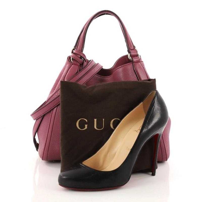 This authentic Gucci Soho Convertible Shoulder Bag Leather Small is a fresh, casual-chic tote made for everyday excursions. Crafted from purple leather, this no-fuss tote features Gucci's signature interlocking GG logo stitched at the front, dual