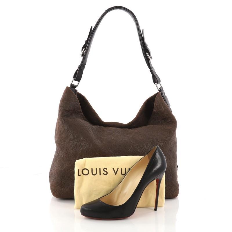 This authentic Louis Vuitton Antheia Hobo Leather PM, inspired by the Greek goddess of flowers mixes casual elegance with exquisite craftsmanship. Luxuriously crafted from brown leather with Louis Vuitton's monogram flower embossed stitching, this