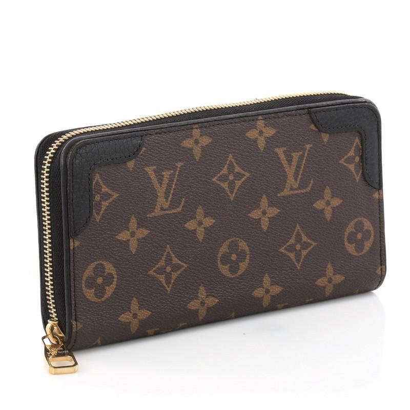 This authentic Louis Vuitton Retiro Zippy Wallet Monogram Canvas is your perfect small accessory. Crafted in brown monogram coated canvas, this wallet features black leather trims and gold-tone hardware accents. Its zip closure opens to a black