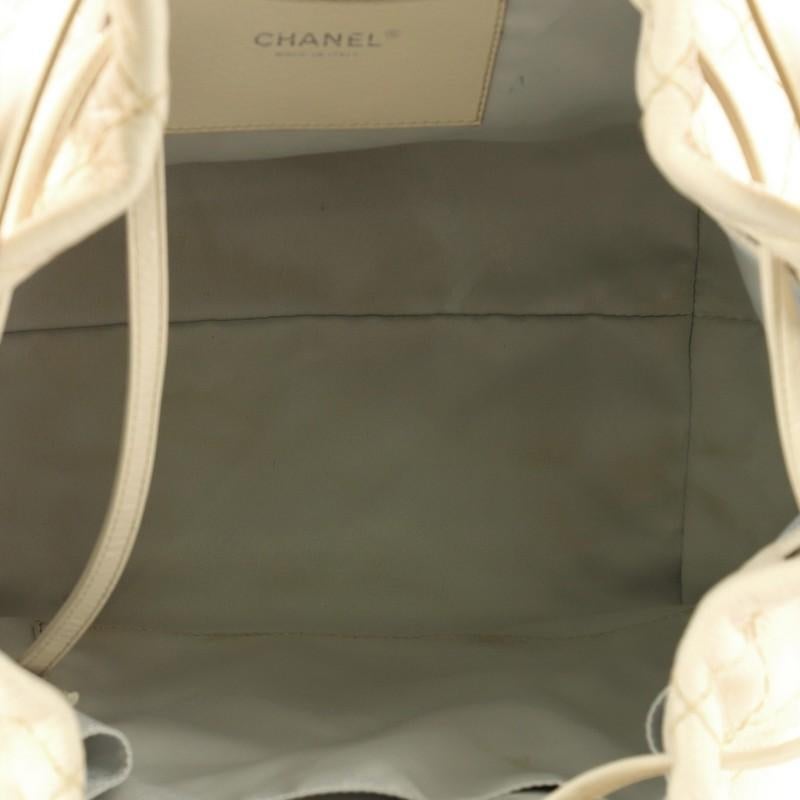 White Chanel On the Road Drawstring Bucket Bag Quilted Glazed Leather