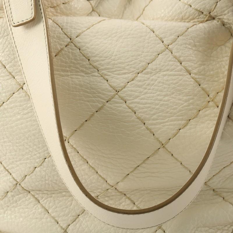 Women's or Men's Chanel On the Road Drawstring Bucket Bag Quilted Glazed Leather