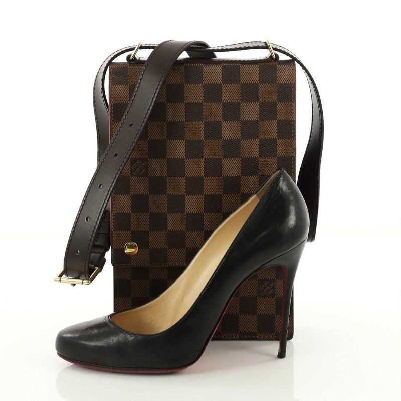 This authentic Louis Vuitton Portobello Messenger Damier is a beautifully designed bag perfect for on the go fashionistas. Crafted from damier ebene coated canvas, this unique messenger bag features sliding adjustable shoulder strap, large clear ID