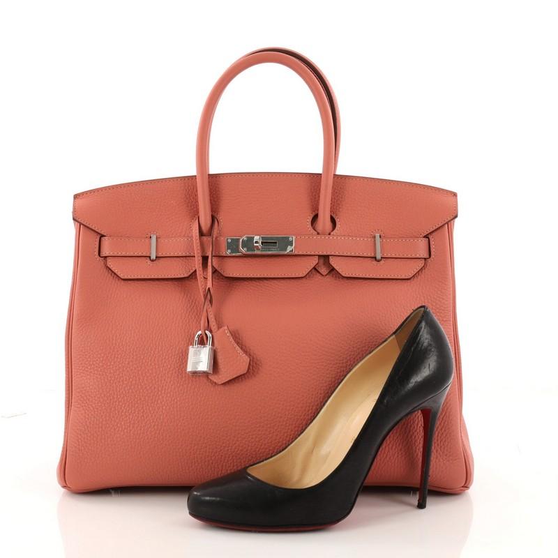 This authentic Hermes Birkin Handbag Rose Tea Clemence with Palladium Hardware 35 is synonymous to traditional Hermes luxury. Crafted with sturdy, scratch-resistant Rose Tea Clemence leather, this eye-catching luxurious tote is accented with