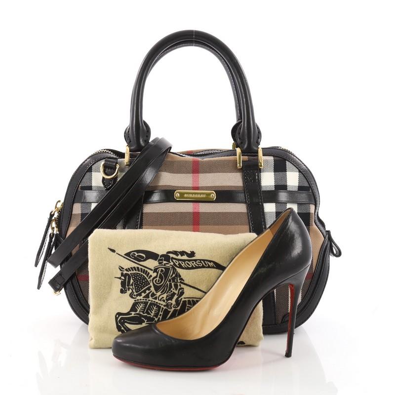 This authentic Burberry Bridle Orchard Bag House Check Canvas Small has an elegant and simplistic design with a compact silhouette that is ideal for everyday use. Crafted from Burberry house check canvas fabric with black calfskin leather trims,