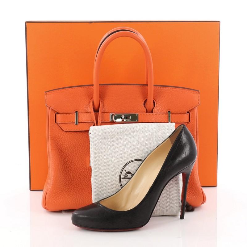 This authentic Hermes Birkin Handbag Orange Clemence with Palladium Hardware 30 stands as one of the most-coveted accessory made for the modern woman. Crafted from orange clemence leather, this stand-out tote features dual-rolled top handles,