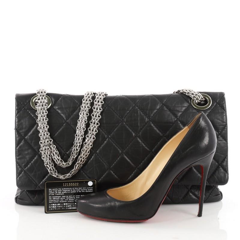 This authentic Chanel Mobile Art Reissue 2.55 Handbag Quilted Aged Calfskin 227 is a gorgeous shoulder bag, ideal for a wardrobe staple, with the luxe appeal. Crafted in black quilted aged calfskin, this stylish bag features reissue chain shoulder