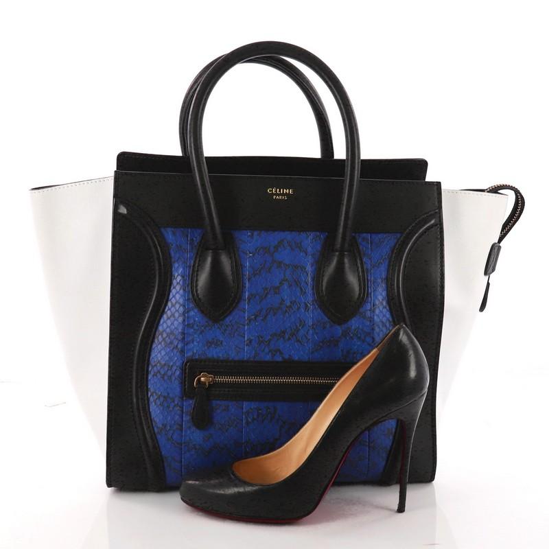 This authentic Celine Tricolor Luggage Handbag Python and Leather Mini is one of the most sought-after bags beloved by fashionistas. Crafted from blue genuine python skin, white leather wings and black leather trims, this minimalist tote features