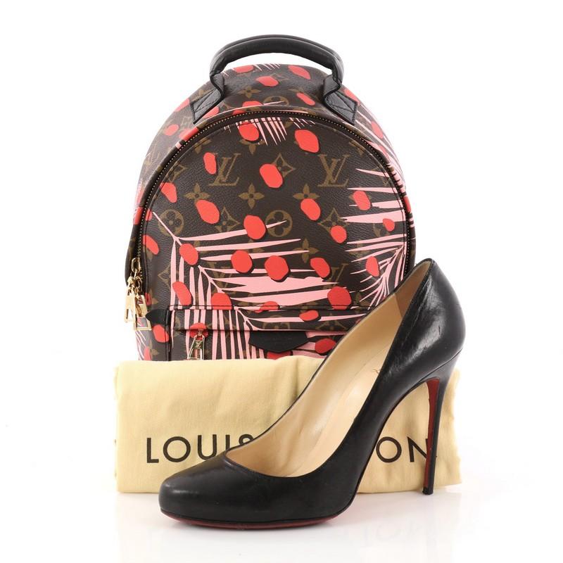 This authentic Louis Vuitton Palm Springs Backpack Limited Edition Jungle Dots PM is a versatile backpack with timeless appeal, ideal for everyday essentials. Crafted from brown monogram coated canvas with monogram palm leaves and jungle dots print